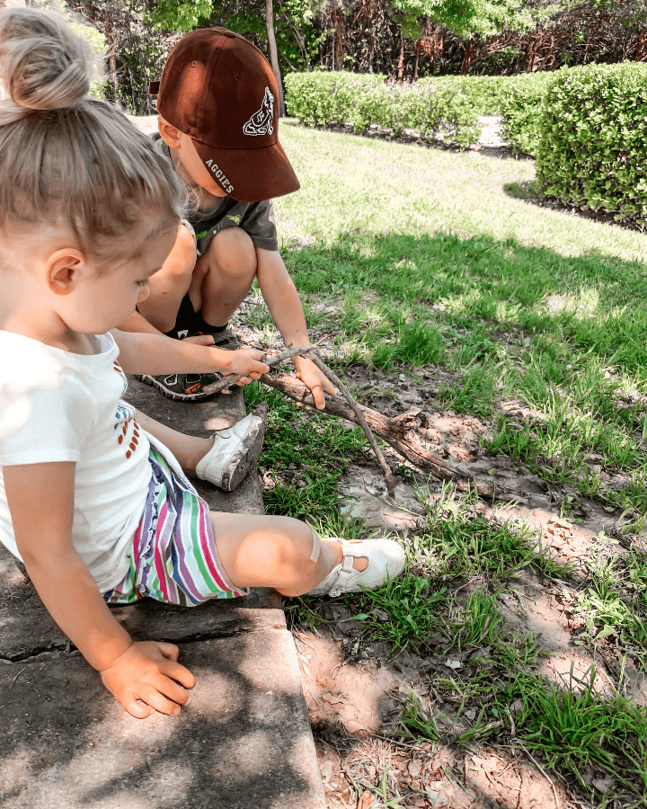 Two children digging in the dirt blog image